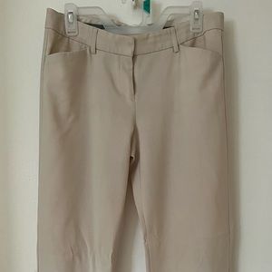 Cream express dress pants with standard boot leg. No damage. Lowest $ listed